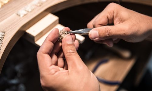 jewelry-maker-creating-golden-piece-scaled.jpg